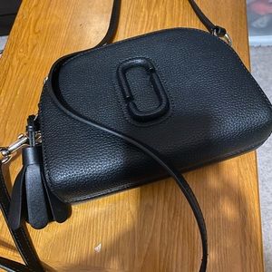 Authentic Marc Jacobs sling bag with dust bag.